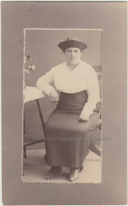 Serious Lady In Upturned Straw Hat pc1