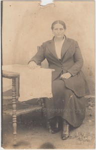 Woman Seated At Table pc1